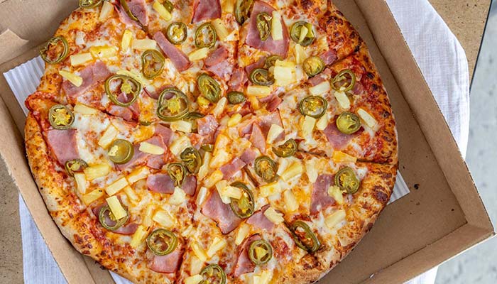 Cousin Vinny's Fiery Hawaiian Pizza in Middletown is made with authentic fresh ingredients